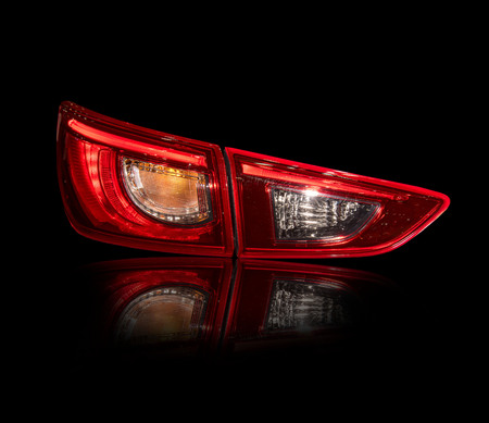 Car tail lights that are separate from the white background.の写真素材