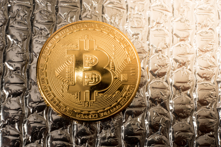 bit coin with the needs of the people on this planet. Separated from the background.の写真素材