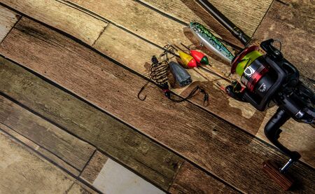 Fishing tackle On wooden floor, technology for Sportsの写真素材