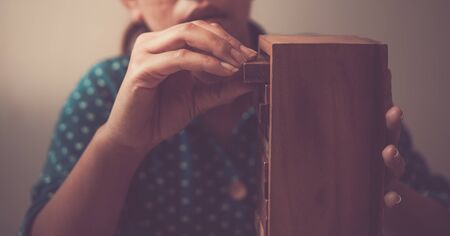 The handle holds the wood. Study the idea concept.の写真素材