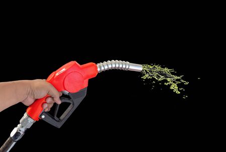Fuel nozzle Hand holding Oil extracted from the white background