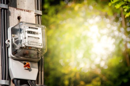 Electricity meter, wind turbine, solar cell, natural energy technologyの写真素材