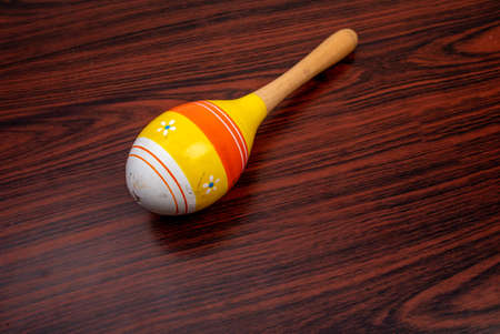 Maracas, or sax, is a wooden floor percussion instrument.
