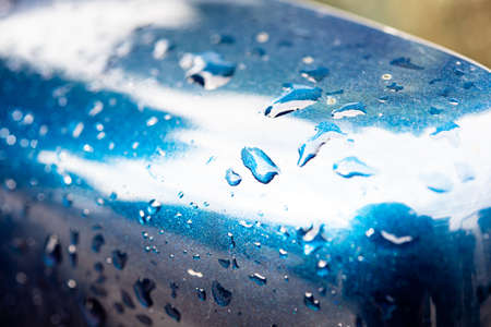 Water droplets on the mirror surface naturally clean water.の写真素材