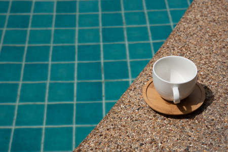 White water glass by the pool Bright in summer, vacation, vacation, travelの写真素材