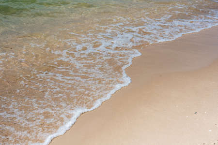 Wave, sandy beach, clear blue water View of the sea, sunrise, Asia, tourism, power of the sea,...