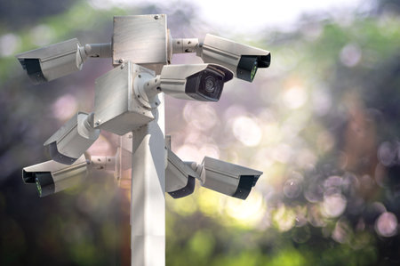 Multi-angle CCTV on pillar against blurred