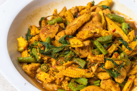 Yellow curry street food Stir-fried chicken with soft fried rice. Flip the curry in the south of Asia. thailand street food with a spicy, aromatic, delicious taste of herbsの写真素材