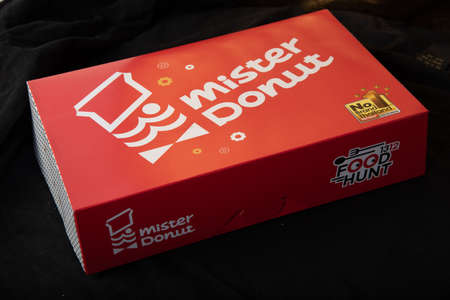 Mister Donut Bangkok,Thailand,:Mister Donut,Donuts are lined up on a tray. Under the brand Mr....