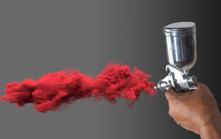 Professional paint gun isolated on white background.,Spray paint, men's hands, handle stainless...