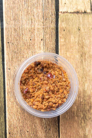 Asian street food chili paste, on the wooden floor, chili pasteの写真素材