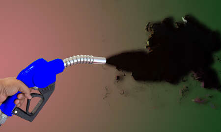 Fuel nozzle Hand holding Oil extracted from the background, clipingpartの写真素材
