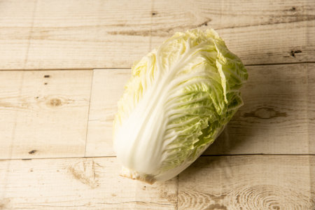 Lettuce on wooden background, healthy vegetable, foodの写真素材