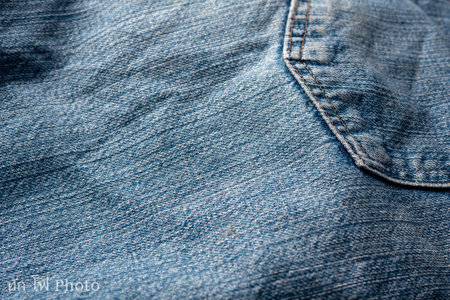 Jeans Fabric Pattern Background: Jeans Background Image Creating a background picture with a fabric pattern for jeans can add a unique and stylish touch to your design. Here's how you can describe the concept:の写真素材