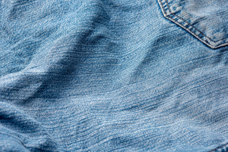 Jeans Fabric Pattern Background: Jeans Background Image Creating a background picture with a fabric pattern for jeans can add a unique and stylish touch to your design. Here's how you can describe the concept:の写真素材