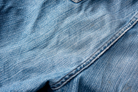 Jeans Fabric Pattern Background: Jeans Background Image Creating a background picture with a fabric pattern for jeans can add a unique and stylish touch to your design. Here's how you can describe the concept:の写真素材