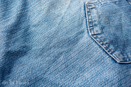 Jeans Fabric Pattern Background: Jeans Background Image Creating a background picture with a fabric pattern for jeans can add a unique and stylish touch to your design. Here's how you can describe the concept:の写真素材