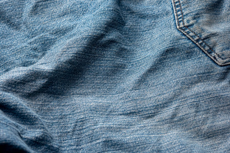Jeans Fabric Pattern Background: Jeans Background Image Creating a background picture with a fabric pattern for jeans can add a unique and stylish touch to your design. Here's how you can describe the concept:の写真素材
