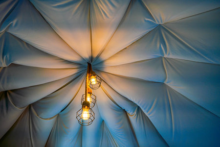 Ceiling lights and black decorations Chandeliers are popular and creative decorations.の写真素材