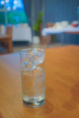 Drinking water in a clean glass, white, hygienic, healthy.の写真素材