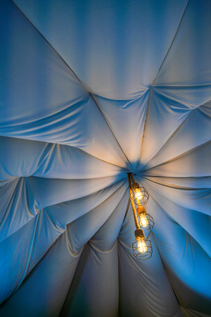 Ceiling lights and black decorations Chandeliers are popular and creative decorations.の写真素材