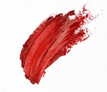 Smudged red lipstick isolated white backgroundの写真素材