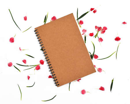 Blank cover eco notebook with carnation flowerの写真素材