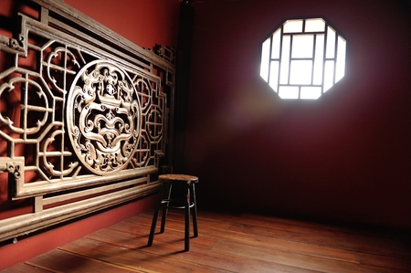 The chinese chair in the chineses red roomの写真素材