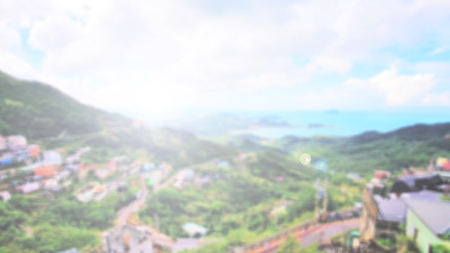 Blurred mountainous background with sunlightの写真素材