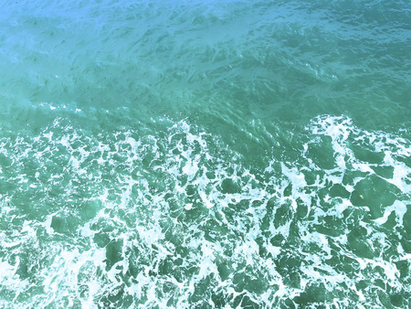 Gushing sea waves of a small excursion from ferry
