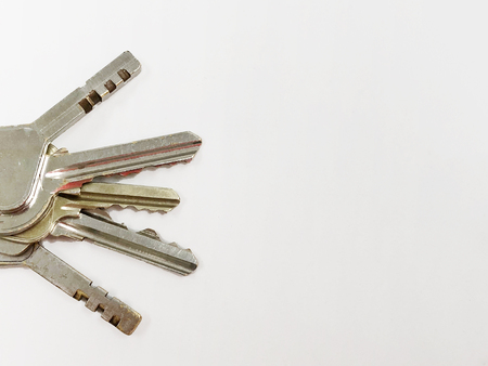 Top view - Bunch of keys on white backgroundの写真素材
