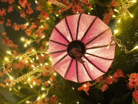 Red Chinese lantern hanging, view from belowの写真素材
