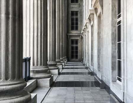 Empty walkway surrounded by majestic stone pillars at both sidesのeditorial素材