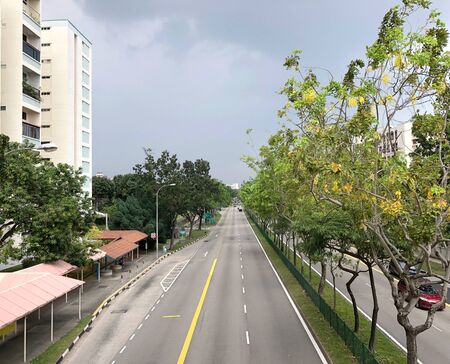 Aerial view of empty street with no vehicle on the roadの写真素材