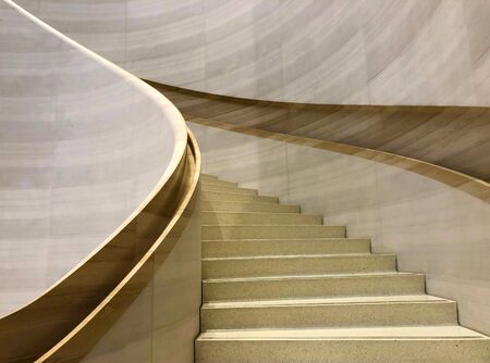 Curvy/ round/ circle/ spiral staircase with clean aesthetic and minimalist designsの写真素材