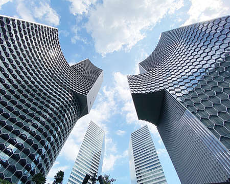 Singapore - Feb 15 2020: Abstract view of the beehives facade of the Duo Residences on Beach Road, a new iconic 49-storey residential tower in the heart of Bugis and the CBD of Singaporeのeditorial素材