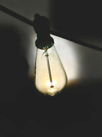 light bulb on dark background. Idea concept.の写真素材