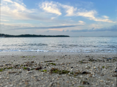 beautiful calm beach under cloudy sky - peaceful and tranquil concept