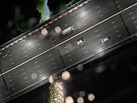 Aerial view of highway road in the city at night. Top view.