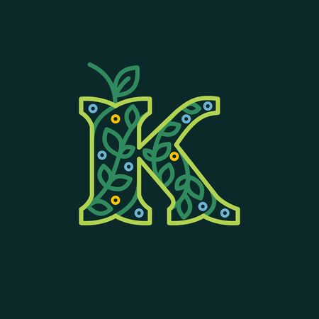 Premium vector typeface with green leaves and dew dots for eco, vegan, bio, raw, organic template.のイラスト素材
