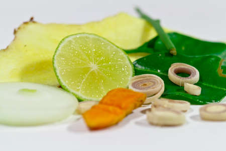 Ingredients for an authentic Asian dish comprising of Turmeric,Lemon grass,onion,Leaves leech lime,の写真素材