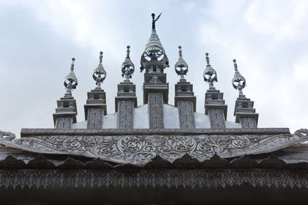 Thai style silver carving art on temple の写真素材
