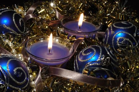 Christmas still life with candles, glare and ballsの写真素材