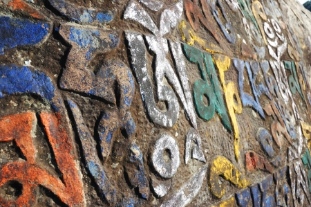 Sacred mani stones with tibetan inscribed mantra  in Rewalsar,Himachal pradesh,Indiaの写真素材