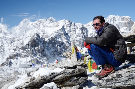 Kala Patthar,Nepal,April 22,2013 - climber sitting at the foot of Kala Patthar mountain near Gorakshep village, Everest region, Nepal. Kala Patthar mountain has excellent view to Chomolungma summit   のeditorial素材