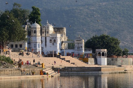 Pushkar,India,November 12,2013 - people holy ghats in the evening at sacred Sarovar lake Pushkar - famous worship place in Indiaのeditorial素材