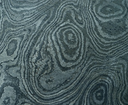 Damascus steel with original pattern - forged metal,traditionally used for creating cold arms on...