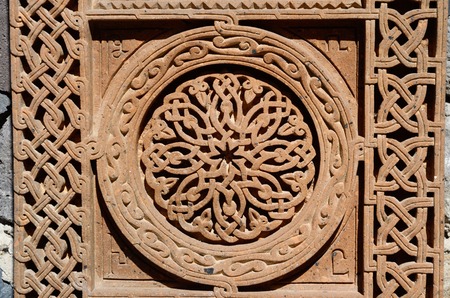 Ornamental knotworks of armenian cross stones - khachkars,medieval christian art,unesco world heritage siteの写真素材