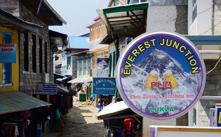 LUKLA,NEPAL - APRIL 14,2013:Street market, cafe and restaurants of Lukla city.City is  known by its one of most dangerous airports in the world - Tenzing-Hillary Airport and also as place where tourists starting Everest Base camp trekのeditorial素材