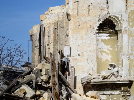 Wall of abandoned ruined building with niche for sculptureの写真素材